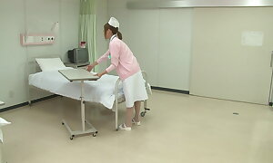 Hot Japanese Nurse gets banged at polyclinic bed away from a blistering patient!