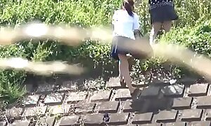 Japanese students jizz-swapping outdoors