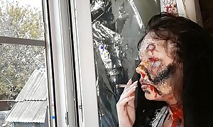 wife smokes cigarette make-up zombie
