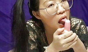 Super sexy cute Asian girl show her convention respecting an increment of play respecting her vibrator