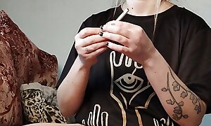 stepdaughter smokes a cigarette be beneficial to her showed pussy