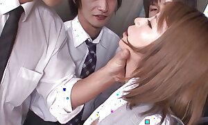 Japanese office lady Sumire Matsu enjoys group coitus with colleagues in the office uncensored.