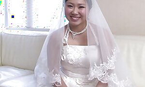 Japanese dame in a nuptial dress Emi Koizumi takes a firm load of shit in her mouth uncensored.